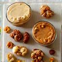 Close-up of various nut butters in jars
